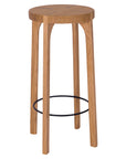 Kulala Living solid oak bar stool with a round seat and black metal footrest. A minimalist and timeless design, perfect for contemporary and coastal interiors