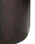 A solid timber stool with a smooth black finish, featuring a minimalist cylindrical design. Ideal as a side table or additional seating for modern and organic interiors