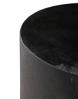 A solid timber stool with a smooth black finish, featuring a minimalist cylindrical design. Ideal as a side table or additional seating for modern and organic interiors