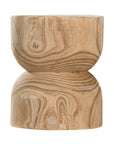 A sculptural solid timber stool with a curved silhouette, showcasing natural wood grain patterns. Versatile as a side table or additional seating, perfect for organic and modern interiors