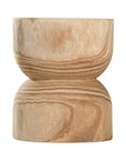 A sculptural solid timber stool with a curved silhouette, showcasing natural wood grain patterns. Versatile as a side table or additional seating, perfect for organic and modern interiors