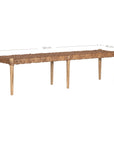 Natural teak and leather bench with a woven seat and solid wooden frame, showcasing artisanal craftsmanship and organic textures