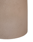 Tarran side table in nomad dune with sculptural pedestal base and rounded top shown in a clean minimal setting.