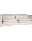 Modern double cloud cushioned sofa in neutral beige with plush pillows and solid wood legs, perfect for contemporary living spaces