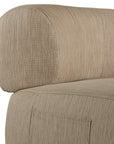 A contemporary taupe upholstered lounge chair with a low-profile design and curved backrest. This modern, armless seating piece features a smooth, rounded silhouette, making it a stylish and comfortable addition to any living space