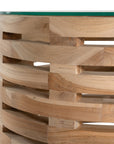 The Kulala Living Teak and Glass Coffee Table features a beautifully crafted open-weave teak base with a round glass top. This contemporary design blends natural warmth with modern elegance, making it a stylish centrepiece for any living space.