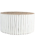 A round coffee table crafted from natural teak branches, arranged in a drum-style design. The organic texture and neutral tones make it a statement piece for coastal and contemporary interiors