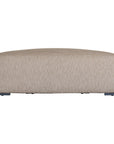 Curved upholstered ottoman with natural textured fabric and subtle black feet, ideal for contemporary living spaces