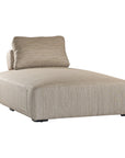 Natural textured outdoor fabric chaise lounge with plush cushion, offering luxurious and relaxing seating for contemporary interiors.