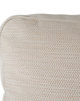 Natural textured outdoor fabric one seater lounge with plush cushion, offering luxurious and relaxing seating for contemporary interiors.