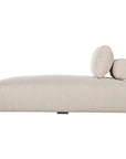 Natural textured outdoor fabric chaise lounge with plush cushion, offering luxurious and relaxing seating for contemporary interiors.
