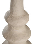 Sculptural table lamp with a cream textured paper mache base and neutral linen shade, adding organic elegance to any space