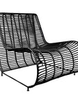 Sleek black rattan lounge chair with a modern curved silhouette and sturdy metal frame, perfect for outdoor or indoor relaxation spaces