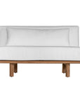 A contemporary armless sofa with plush white cushions and a sturdy natural teak wood frame. This minimalist lounge piece offers versatile seating, perfect for modern living spaces or outdoor settings