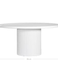 KULALA Living Modern white round dining table featuring a smooth tabletop and a fluted pedestal base. A contemporary statement piece designed to bring elegance and sophistication to any dining space.