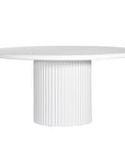 Modern white round dining table featuring a smooth tabletop and a fluted pedestal base. A contemporary statement piece designed to bring elegance and sophistication to any dining space.