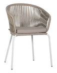 White and natural outdoor dining chair featuring a woven rope backrest and sleek metal legs, designed for modern alfresco dining and stylish patio settings