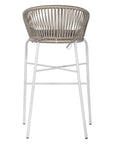 White natural outdoor bar chair featuring a woven rope backrest and sleek metal legs, designed for modern alfresco dining and stylish patio settings