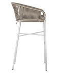 White natural outdoor bar chair featuring a woven rope backrest and sleek metal legs, designed for modern alfresco dining and stylish patio settings