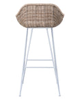 White natural rattan bar chair with curved back and slim metal legs, perfect for modern and stylish dining settings