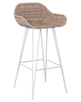 White natural rattan bar chair with curved back and slim metal legs, perfect for modern and stylish dining settings