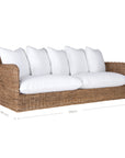 A contemporary white natural woven sofa with plush, generously filled cushions, offering both comfort and style for a refined coastal or modern living space.