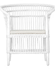 A beautifully crafted white rattan armchair with an open-weave design and a white cushioned seat, perfect for adding a relaxed coastal touch to any space