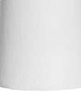 White sculptural vase with unique handles, adding a touch of contemporary elegance to home decor