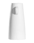 White sculptural vase with unique handles, adding a touch of contemporary elegance to home decor