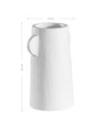 White sculptural vase with unique handles, adding a touch of contemporary elegance to home decor
