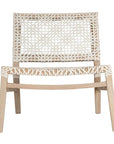 Woven leather armchair with natural wood frame, showcasing intricate handwoven craftsmanship and earthy, relaxed style