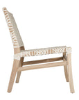 Woven leather armchair with natural wood frame, showcasing intricate handwoven craftsmanship and earthy, relaxed style