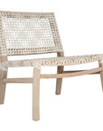 Woven leather armchair with natural wood frame, showcasing intricate handwoven craftsmanship and earthy, relaxed style