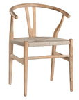 A natural timber wishbone dining chair with a handwoven rope seat, featuring an iconic curved backrest and minimalist Scandinavian-inspired design. Perfect for modern coastal and contemporary interiors, offering both style and comfort