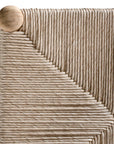 A natural timber wishbone bar stool with a handwoven rope seat, featuring a curved backrest and minimalist Scandinavian-inspired design. Crafted for both comfort and style, this versatile piece is perfect for modern coastal and contemporary interiors