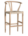 A natural timber wishbone bar stool with a handwoven rope seat, featuring a curved backrest and minimalist Scandinavian-inspired design. Crafted for both comfort and style, this versatile piece is perfect for modern coastal and contemporary interiors