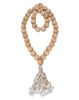 Natural wood bead garland with tassel, perfect for adding rustic charm and texture to home decor