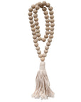 Natural wood bead garland with tassel, perfect for adding rustic charm and texture to home decor