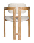 Contemporary wooden arm chair with a natural oak frame and boucle upholstered seat and backrest, designed for modern comfort and style