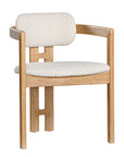 Contemporary wooden arm chair with a natural oak frame and boucle upholstered seat and backrest, designed for modern comfort and style