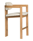 Contemporary wooden bar chair with a natural oak frame and boucle upholstered seat and backrest, designed for modern comfort and style.