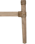 A handcrafted woven rattan bar stool with a natural timber frame, featuring an intricate open-weave design and a curved backrest for stylish comfort