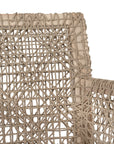 Woven rope armchair with natural teak frame, showcasing intricate handwoven craftsmanship and earthy, relaxed style