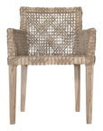 Woven rope armchair with natural teak frame, showcasing intricate handwoven craftsmanship and earthy, relaxed style