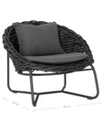 Round woven lounge chair in black with matching dark grey cushion, featuring a curved metal base for modern and stylish outdoor or indoor seating. Durable and comfortable design perfect for relaxed lounging