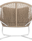 Round woven lounge chair in natural with matching natural cushion, featuring a curved metal base for modern and stylish outdoor or indoor seating. Durable and comfortable design perfect for relaxed lounging