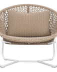 Round woven lounge chair in natural with matching natural cushion, featuring a curved metal base for modern and stylish outdoor or indoor seating. Durable and comfortable design perfect for relaxed lounging