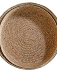 Natural jute woven basket set in three sizes, perfect for stylish storage and adding texture to modern interiors.