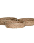 Natural jute woven basket set in three sizes, perfect for stylish storage and adding texture to modern interiors.
