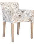Woven leather armchair with natural wood frame, showcasing intricate handwoven craftsmanship and earthy, relaxed style